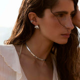 Brincos Tesara